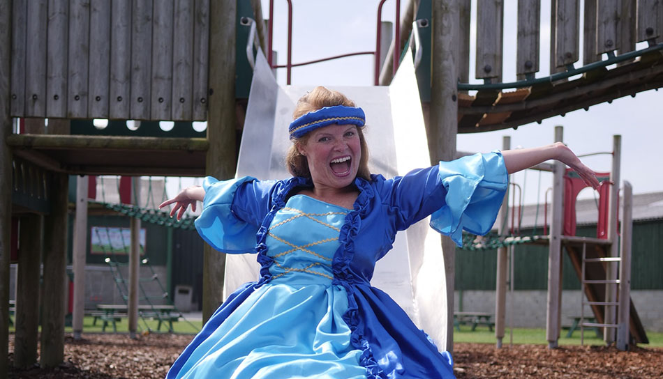 Princess coming down a slide